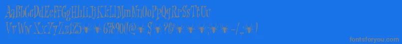 Fonte Griezelig DEMO – fontes cinzas em um fundo azul