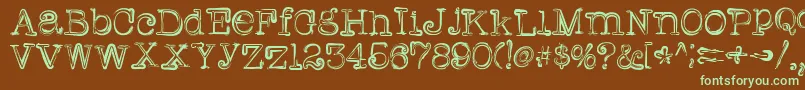 フォントGriffin – 緑色の文字が茶色の背景にあります。