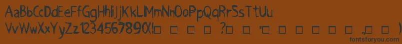 GRIMACE-Schriftart – Schwarze Schriften auf braunem Hintergrund