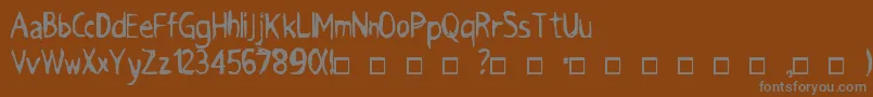 フォントGRIMACE – 茶色の背景に灰色の文字
