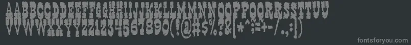 gringo-fontti – harmaat kirjasimet mustalla taustalla