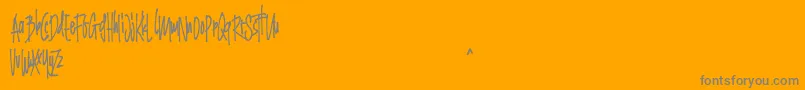 Grinty FREE Font – Gray Fonts on Orange Background
