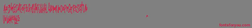 Grinty FREE Font – Red Fonts on Gray Background