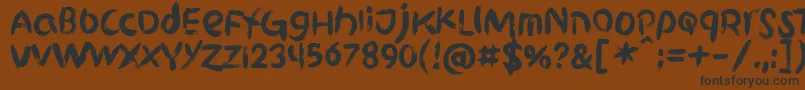 Griphite PERSONAL USE-Schriftart – Schwarze Schriften auf braunem Hintergrund