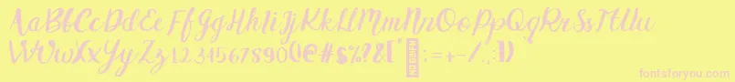 Griselda Regular Font – Pink Fonts on Yellow Background