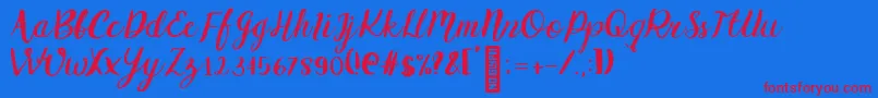 Griselda Regular-Schriftart – Rote Schriften auf blauem Hintergrund