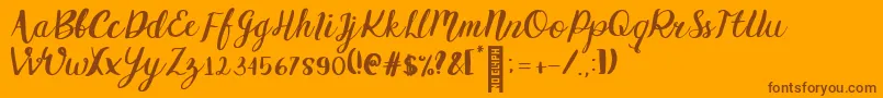 Griselda Regular-Schriftart – Braune Schriften auf orangefarbenem Hintergrund