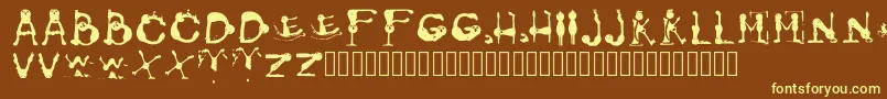 GroversPain Regular Font – Yellow Fonts on Brown Background