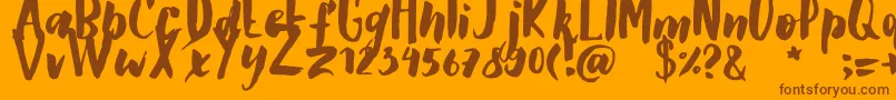 GSClarettaBrush-Schriftart – Braune Schriften auf orangefarbenem Hintergrund