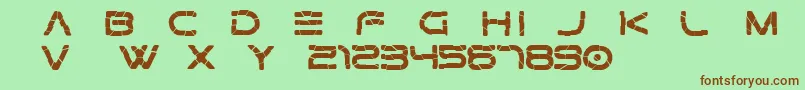 Gtek   Broken Free-Schriftart – Braune Schriften auf grünem Hintergrund