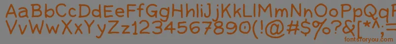 Guacamole Quickstep v2p00 Font – Brown Fonts on Gray Background
