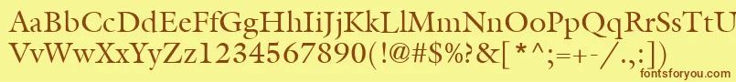 フォントItcGalliardLtRoman – 茶色の文字が黄色の背景にあります。