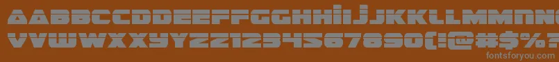 guardian2laser-Schriftart – Graue Schriften auf braunem Hintergrund