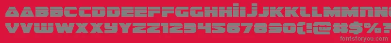 フォントguardian2laser – 赤い背景に灰色の文字