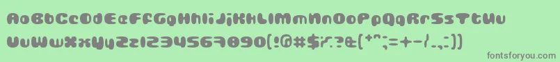 GUBBLA   -Schriftart – Graue Schriften auf grünem Hintergrund