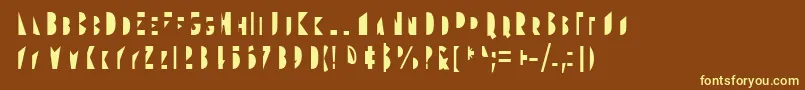 Gudariak Txano-fontti – keltaiset fontit ruskealla taustalla