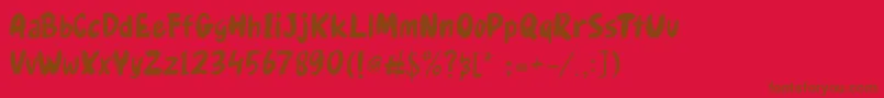 Fonte Gudnite – fontes marrons em um fundo vermelho
