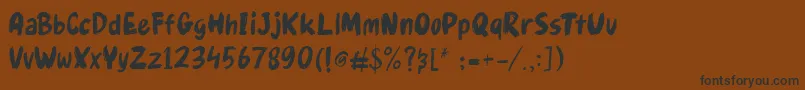 Gudnite Font – Black Fonts on Brown Background