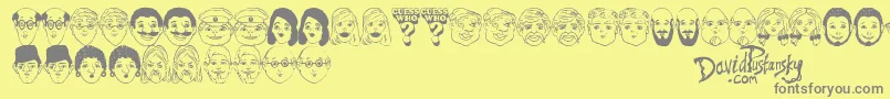 Guess Who-fontti – harmaat kirjasimet keltaisella taustalla