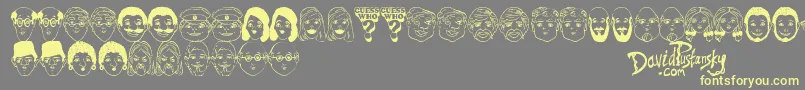 Guess Who-fontti – keltaiset fontit harmaalla taustalla