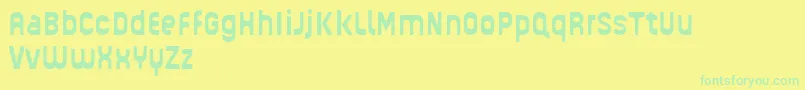 GUHLY Bold reduced-Schriftart – Grüne Schriften auf gelbem Hintergrund