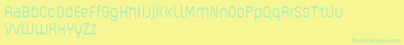 GUHLY Light reduced-Schriftart – Grüne Schriften auf gelbem Hintergrund