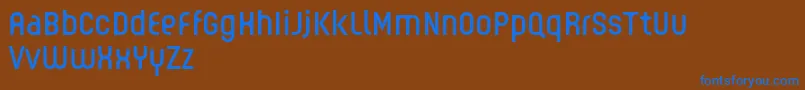 GUHLY Regular reduced Font – Blue Fonts on Brown Background