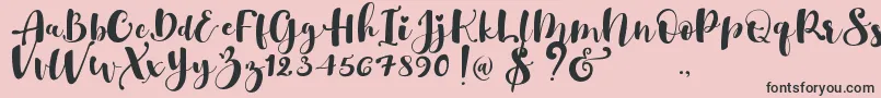 Fonte Gulya Script   – fontes pretas em um fundo rosa