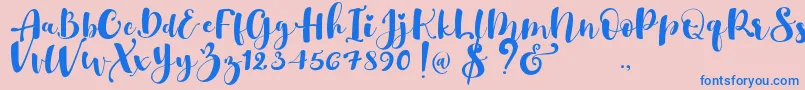 Gulya Script  -fontti – siniset fontit vaaleanpunaisella taustalla