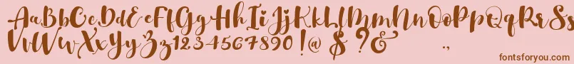 fuente Gulya Script   – Fuentes Marrones Sobre Fondo Rosa