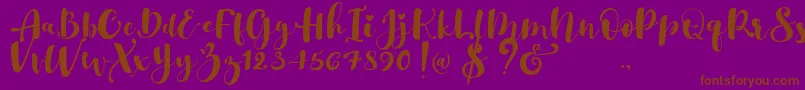 fuente Gulya Script   – Fuentes Marrones Sobre Fondo Morado