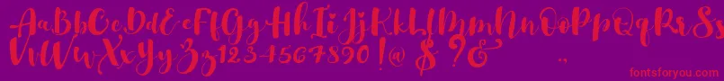 Gulya Script  -fontti – punaiset fontit violetilla taustalla