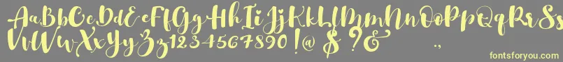 fuente Gulya Script   – Fuentes Amarillas Sobre Fondo Gris