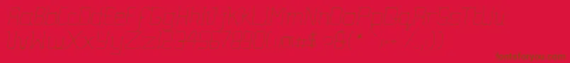 Fonte Gutsy Italic – fontes marrons em um fundo vermelho