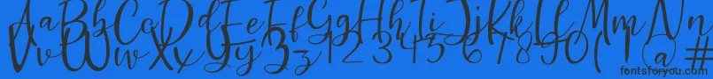 More about Guttenly Font Guttenly Font – Black Fonts on Blue Background