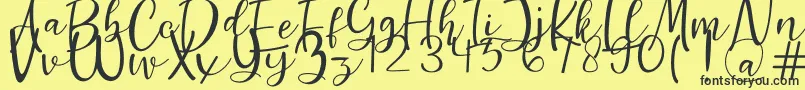 Guttenly Font – Black Fonts on Yellow Background
