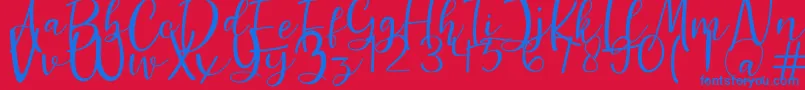 Guttenly Font – Blue Fonts on Red Background