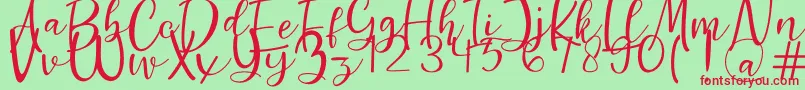 Guttenly Font – Red Fonts on Green Background