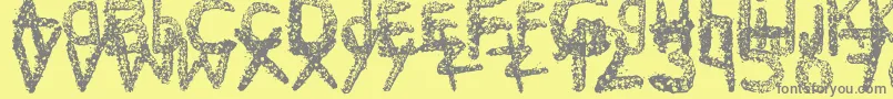 Ke$HanimalMadeByMidnightremedy-Schriftart – Graue Schriften auf gelbem Hintergrund