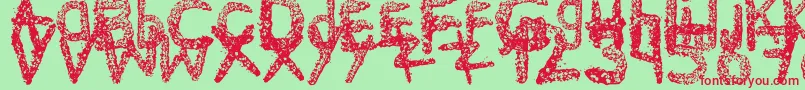 Ke$HanimalMadeByMidnightremedy-fontti – punaiset fontit vihreällä taustalla
