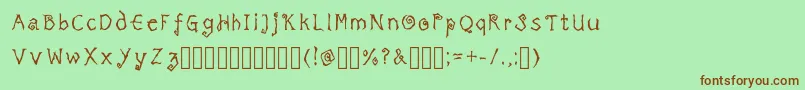 Шрифт TricktreatsleepRegularRegular – коричневые шрифты на зелёном фоне