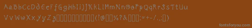 フォントTricktreatsleepRegularRegular – 茶色の背景に灰色の文字