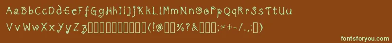 フォントTricktreatsleepRegularRegular – 緑色の文字が茶色の背景にあります。