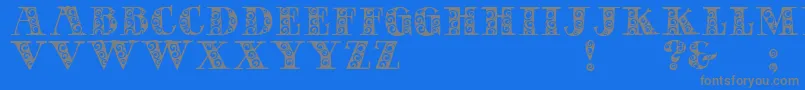 フォントGypsyRose – 青い背景に灰色の文字