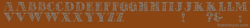 フォントGypsyRose – 茶色の背景に灰色の文字