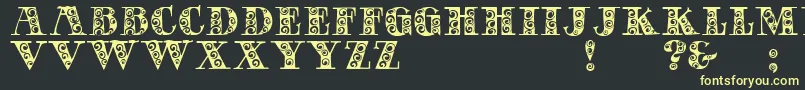 フォントGypsyRose – 黒い背景に黄色の文字