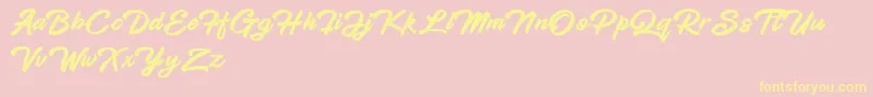 Hadsut Script Font – Yellow Fonts on Pink Background