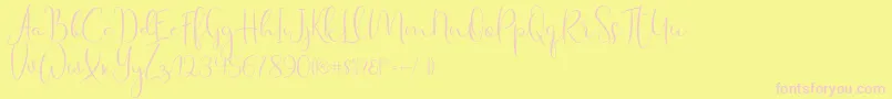 Fonte Haertbel Script – fontes rosa em um fundo amarelo