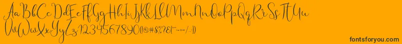 Haertbel Script-Schriftart – Schwarze Schriften auf orangefarbenem Hintergrund