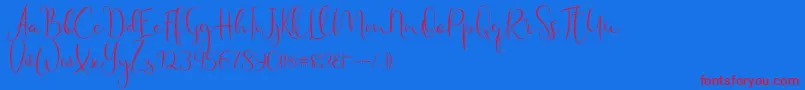 Haertbel Script Font – Red Fonts on Blue Background